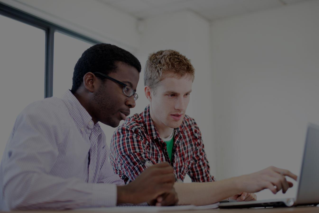 Two male students with laptop v2